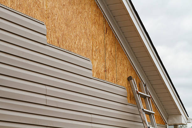 Professional Siding technician working in Xenia, OH